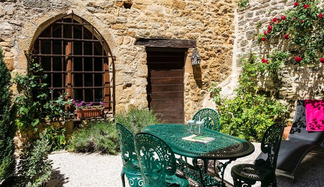 In the heart of Beynac, a rare14th century house