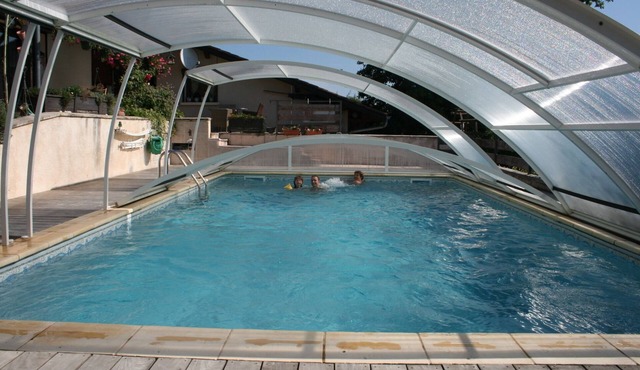 In the heart of the Rhône-Alpes region, air-conditioned apartment for 4 people, swimming pool.