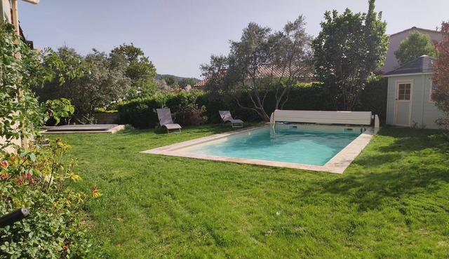 In the heart of a Provencal village house of 130m2 with large pool