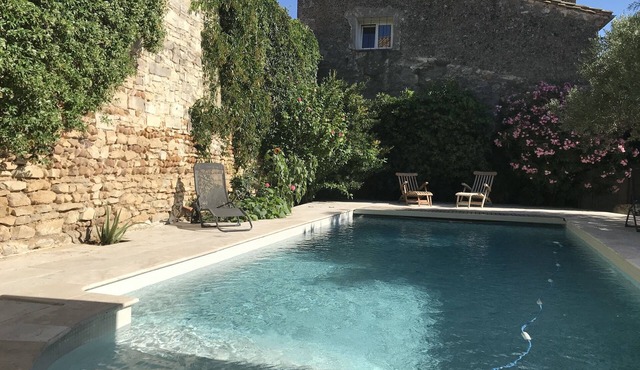 In the heart of the village, large family home 380 m2 with swimming pool