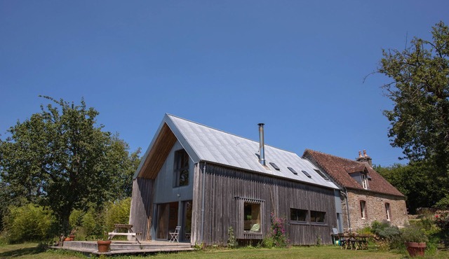 In the Normandy countryside, charming wooden architect's house.