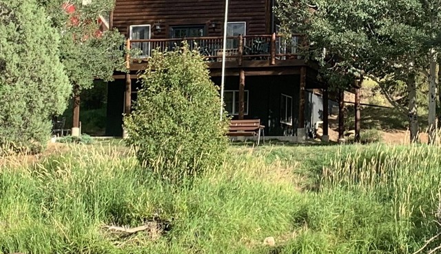 In The Valley Of The Mountains On the Big Laramie River - Flat Nighty Rate