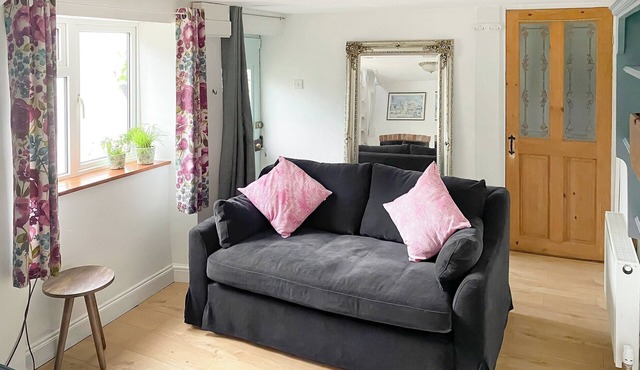 In this idyllic setting, the one-bedroom cottage in Combe St.