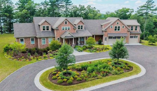 Incredible home on lake with views, private beach, deck, AC, & W/D