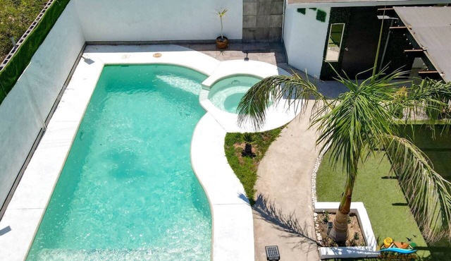 Incredible in-town pool house with BBQ area!