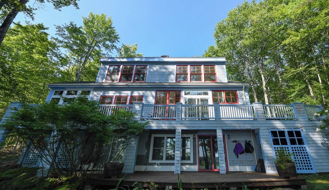 Incredible Lakefront Retreat with Panoramic Sunset Views