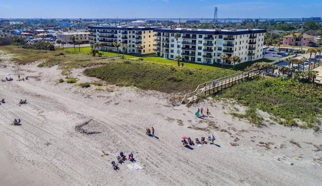 Incredible three bedroom oceanfront corner unit. Out to the beach in seconds!