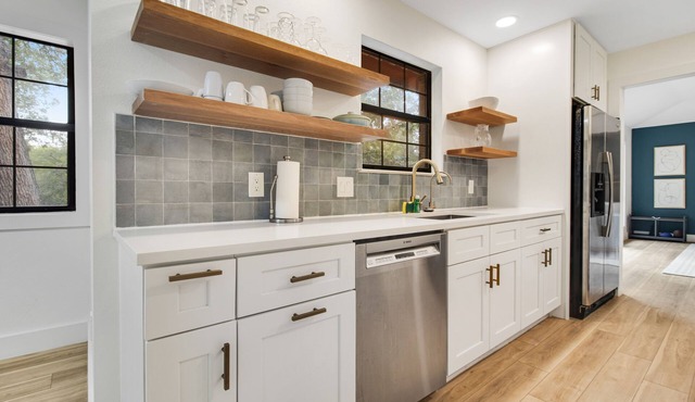 Incredibly spacious home dog-friendly with W/D, kitchen, grill, patio, & games