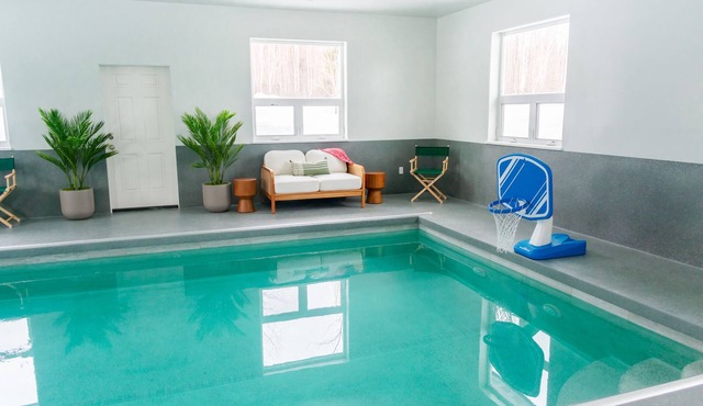 Indoor heated pool, sauna, exquistly decorted private retreat with gated drive