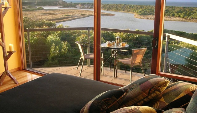 Indulge in a Romantic Spa Apartment with Sweeping Ocean Views