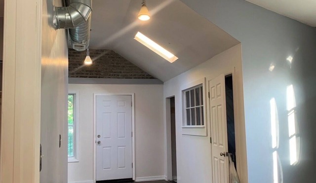 Industrial Loft 2BR + DRUM KIT + Exposed Brick + 2 Private Decks & Lush Backyard