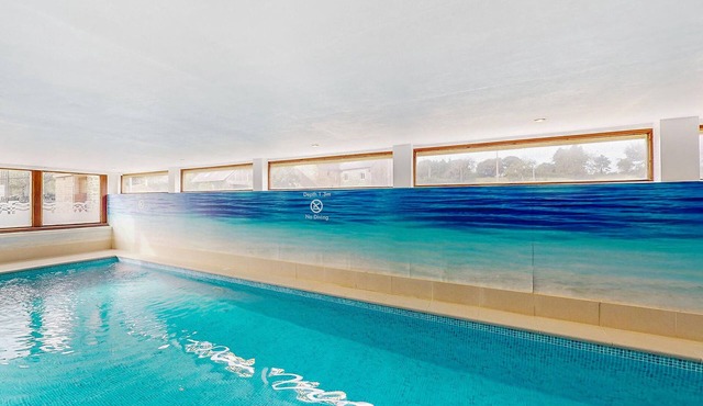 Inviting cottage with indoor community pool and activity room.