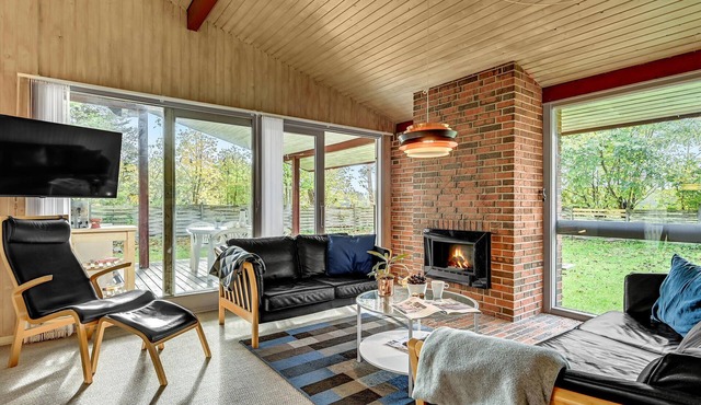 Inviting, family-friendly vacation home with sauna and fjord view.