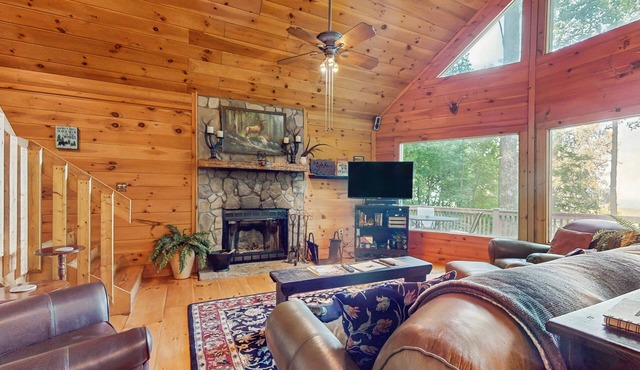 Inviting forest cabin with pool access & picture windows