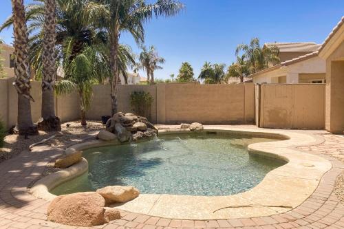 inviting home with private pool, patio, grill, washer dryer, & central AC