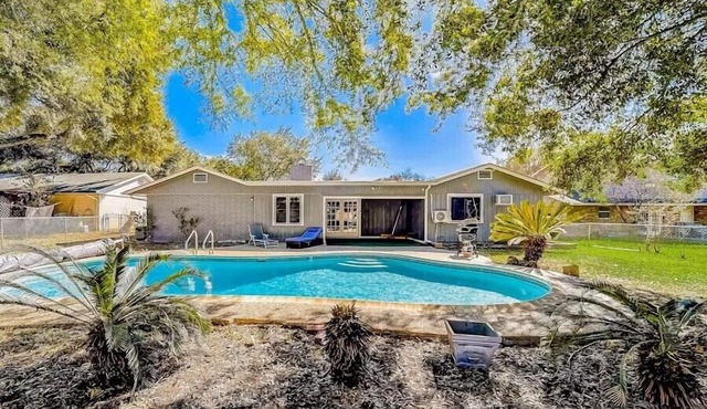 Inviting home with heated pool and dog-friendly