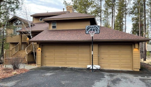 Inviting house with hot tub, game tables, bikes, & partial mountain view