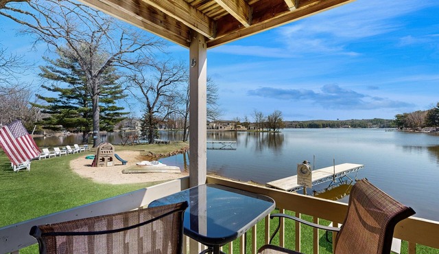 Inviting lakefront condo - amazing views, beach access, fireplace, dock, AC, W/D