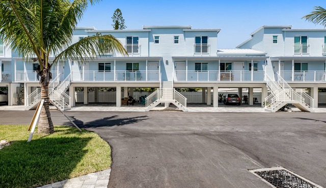 Inviting oceanfront condo with shared pool, dock, and great neighborhood