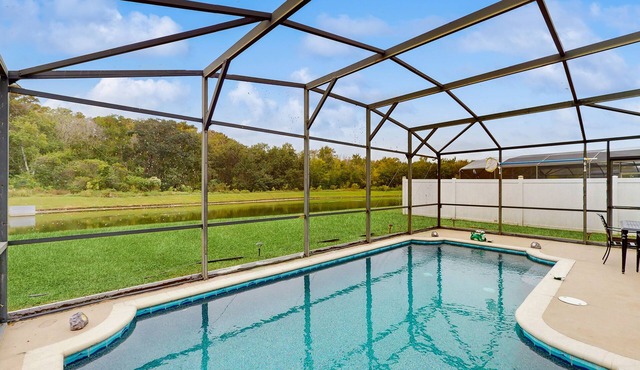 Inviting pool home with tranquil pond view near theme parks & attractions