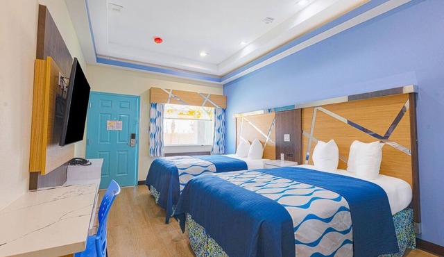 Inviting Room with 2 Queen Beds and Kitchenette Near Woodbridge Lake in Houston