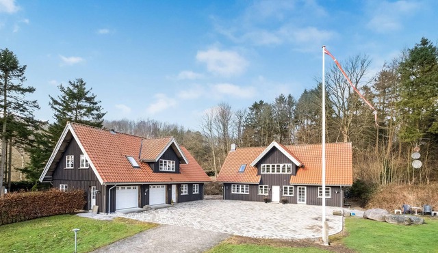 Inviting vacation home with wood stove and grounds, located in a cozy town outside Arhus.