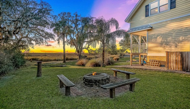 Inviting waterfront cottage w separate garage apartment and stunning marsh view