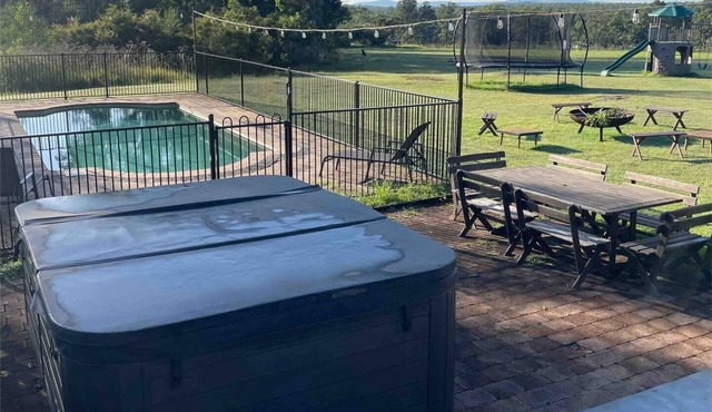 Ironstone Homestead family private pool and hot spa open fire games room