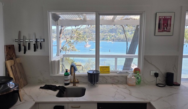 Island escape with private waterfront beach and jetty on Scotland Island.