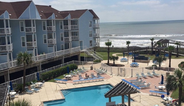 "Island Getaway" Top Floor 1BR condo ON THE BEACH!