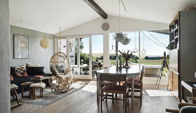 Island weekend home with pastels and view