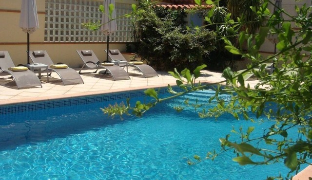 Ivy covered stone Mas part of an 18th century former convent.