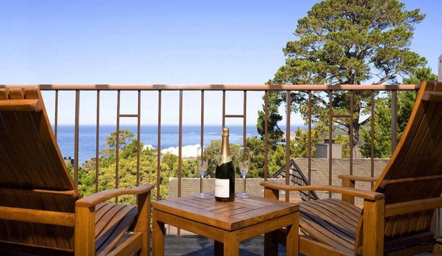 Jacuzzi and fireplace villa with ocean views of Point Lobos and dramatic sunsets
