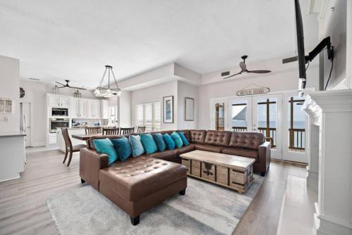 Jaw-dropping bayfront home with panoramic water views, boat slip, and cowboy pool