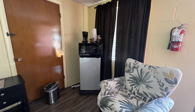 JI4, King Guest Room at the Joplin Inn at entrance to the resort by RedAwning