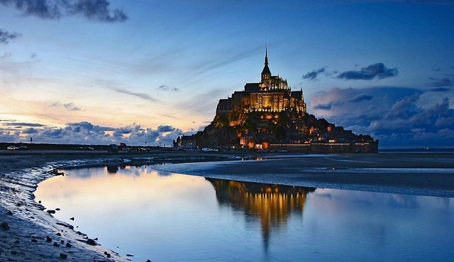 Johnson's house, feet in the water, a few grains of sand.