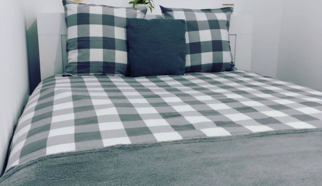 Jullouville - Full center - 50m from the sea - apartment - small garden