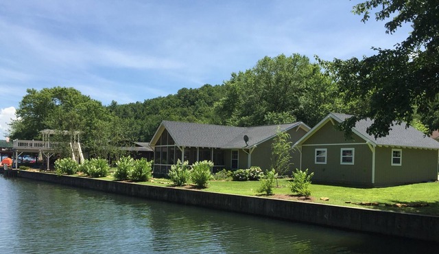 Jump into Lake Burton right out the back door of this water front home!