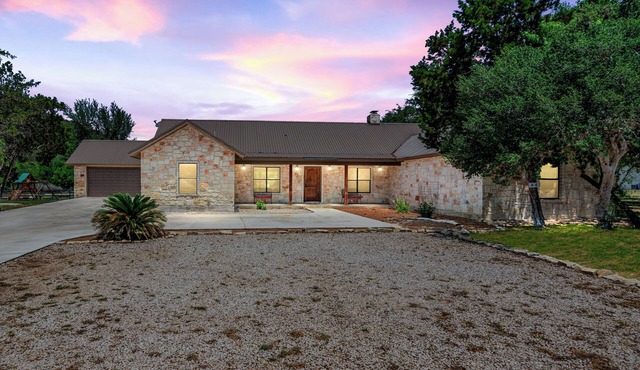 Just steps from THE Frio River in Concan, single story home with private pool