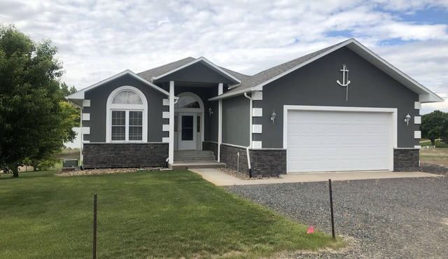 Just steps to the beach. Lakefront Property with Endless Views.