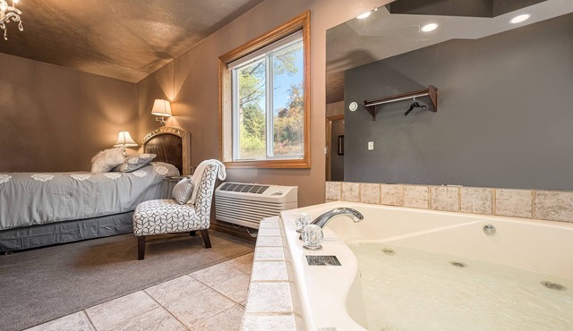 JV Thompson | Jacuzzi Tub Historic Inn Room