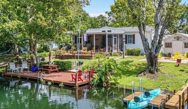 Kayaks, king bed, movie theater, fishing, float mat, yoga, screened lanai