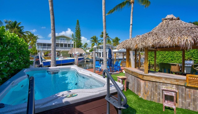 Key Largo Canalfront Home w/Boat Lift, Swim Spa, Tiki Hut & Game Room