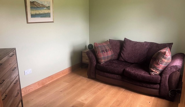 Kick back and relax in this calm, stylish with views of beautiful Strathnairn.