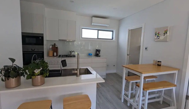 Kick back and relax in this calm and stylish space in Belmore NSW