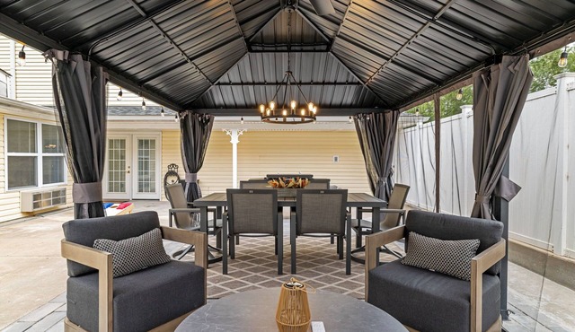 Kimmswick Porch Haven: Hot Tub, Cozy Fire Pit, & Fenced Yard!