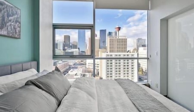 King Bed | Mins to Saddledome | AC | UG Parking