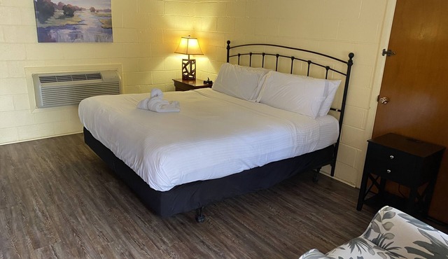 King Guest Room located at the Joplin Inn at the entrance to Mountain Harbor, just 2 1/2 miles from Lake Ouachita. by RedAwning