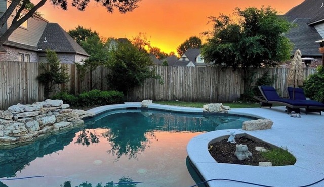 King Room w/ensuite downstairs. 3 Q rooms and full bath upstairs. Luxury kitchen w/giant island, wine cabinet w/sink, Breakfast Rm seats 6. Dining Rm seats 8. Half bath, Patio w/outdoor table, sofa and TV. In-ground pool, pool table, doggie door