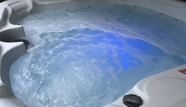 King sized Guest Suite with Private Hot Tub, In Town location.